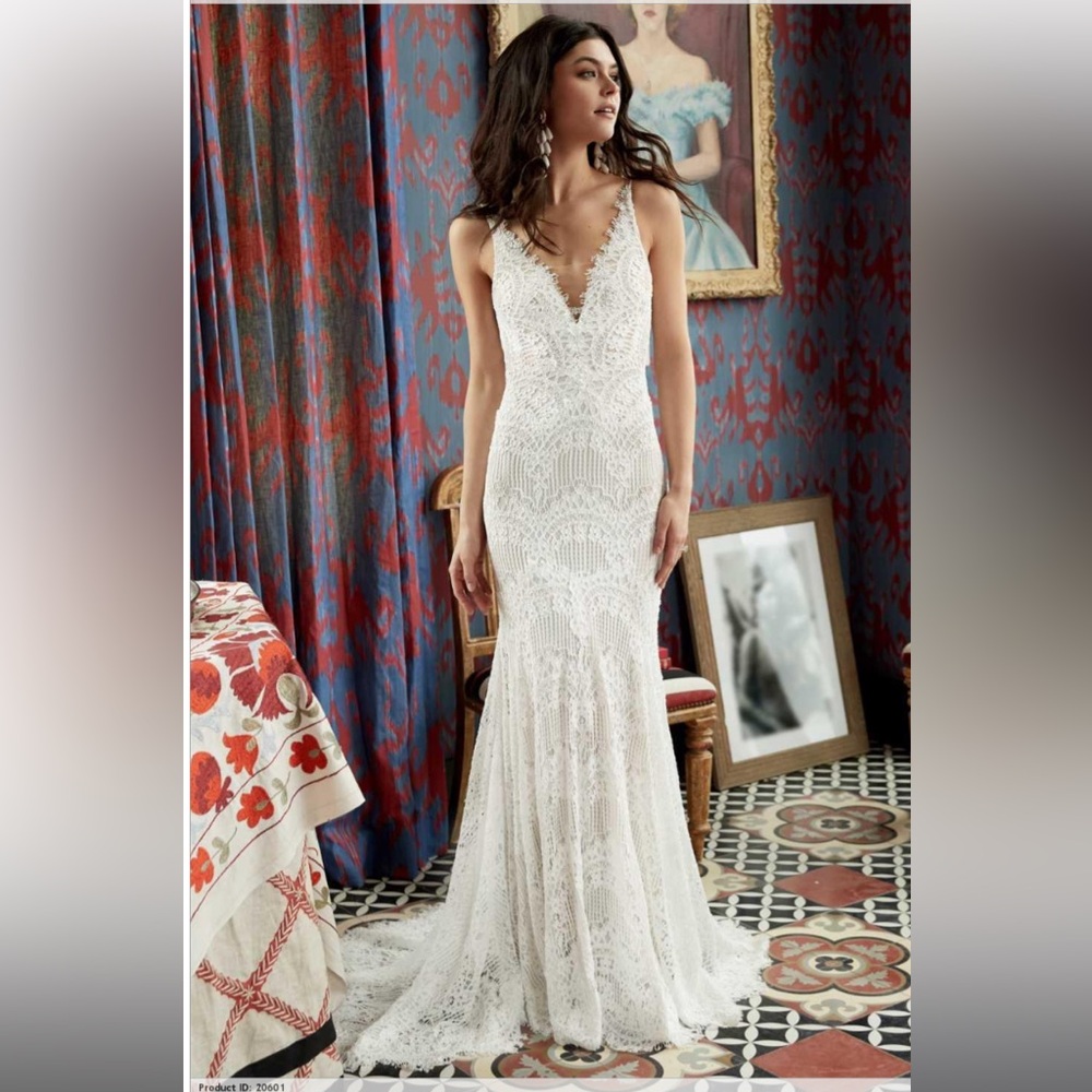 White Sleeveless Plunge Neck Wedding Gown